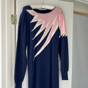 Knitted 70’s/80’s sweater dress. Perfect for a party or everyday wear.